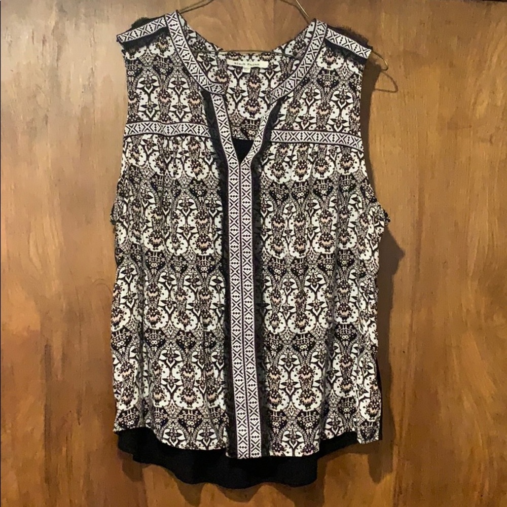 Sleeveless comfortable summer shirt gently used